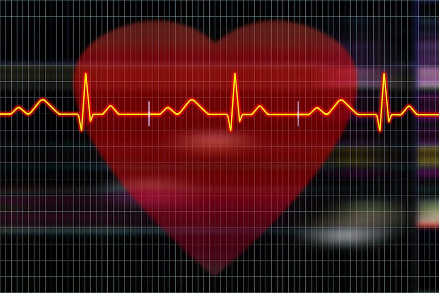 Graphic of a heart with an EKG readout overlay